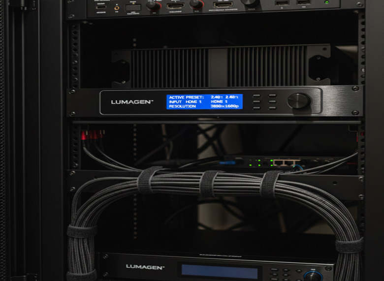 CinemaScope projector setup in a luxury Indian living room without complete room darkening