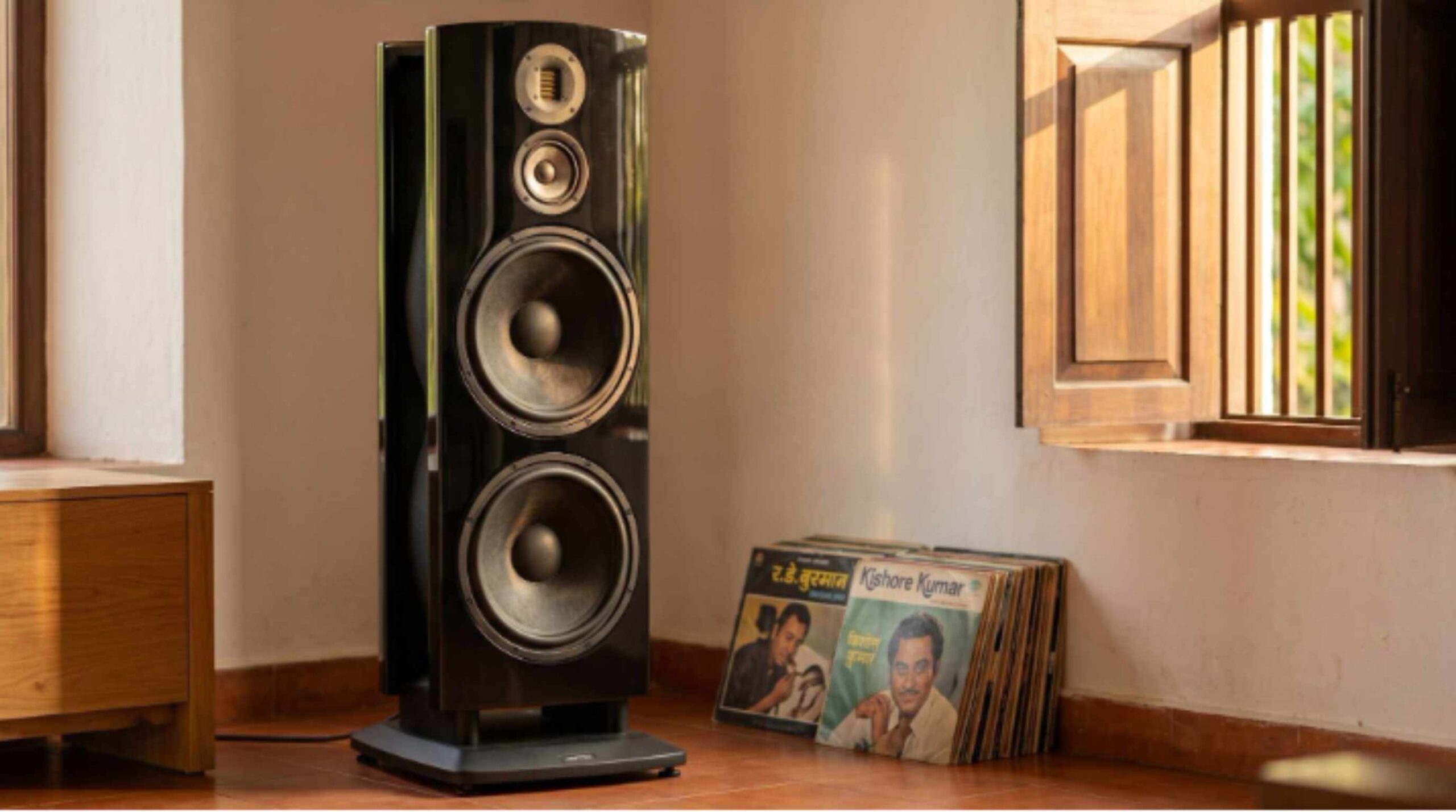 Jamo R909 dipole floor-standing speakers installed in a double-height ceiling living room in Calangute Goa