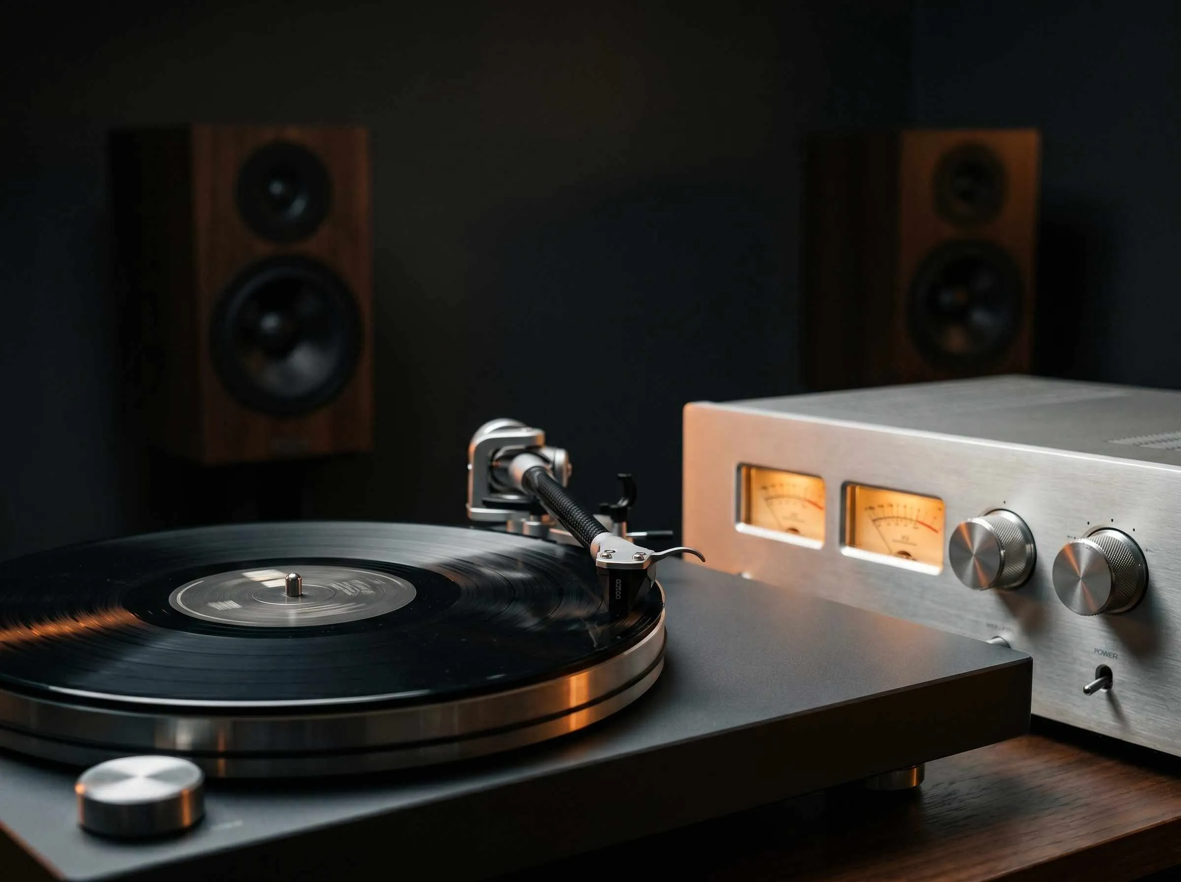 Premium vinyl turntable and stereo amplifier in luxury HiFi audio system setup.